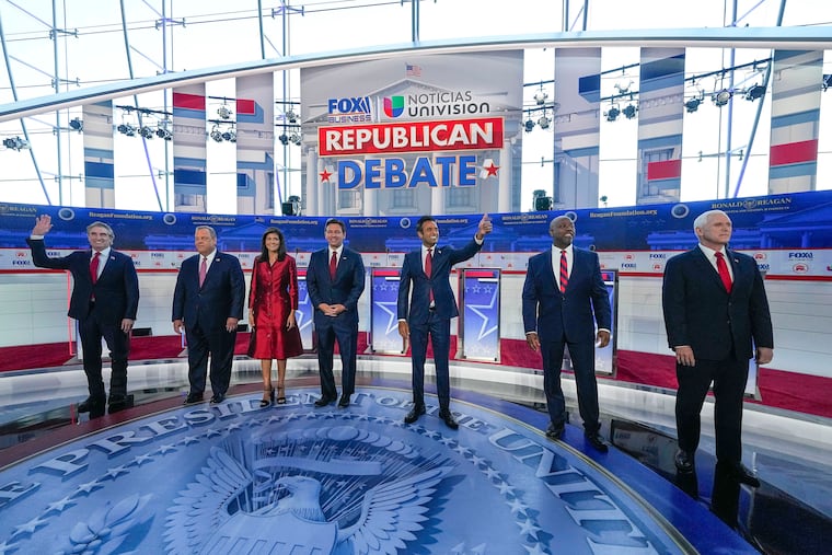 Republican presidential candidates before the start of Wednesday's Republican presidential primary debate in California.
