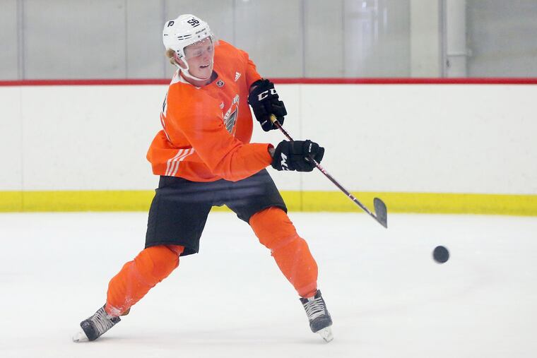 Right winger Wade Allison unleashes a shot during the Flyers' development camp at the Skate Zone in Voorhees.