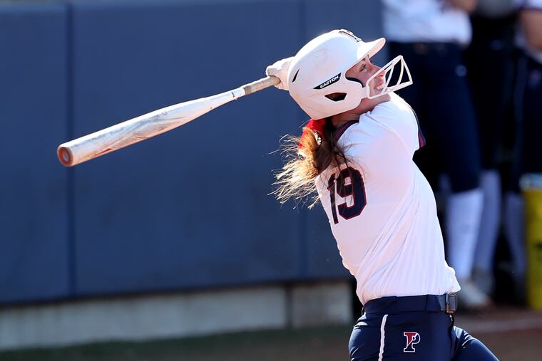 Penn softball player Sarah Schneider hits during a recent game against Drexel.