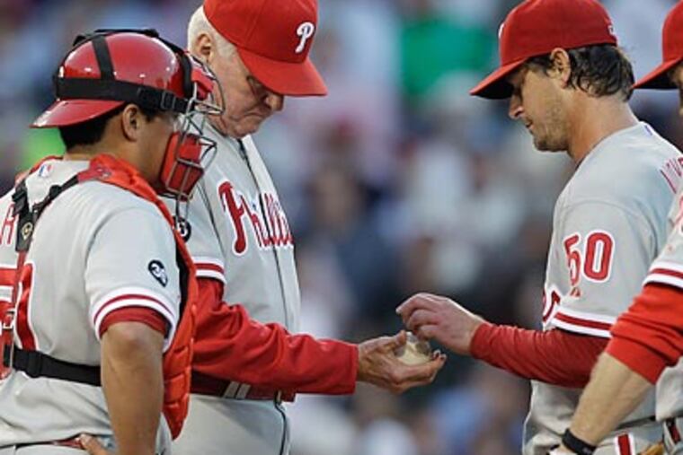 Jamie Moyer allowed nine earned runs on nine hits while recording only three outs. (AP Photo/Charles Krupa)