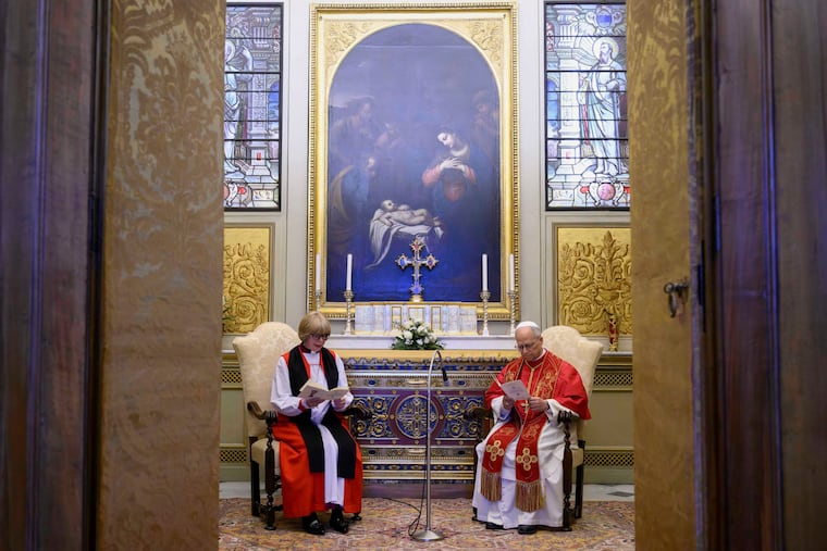 Pope Leo XIV prays with the Archbishop of Canterbury, Sarah Mullally (left) in the Urban VIII Chapel inside the Apostolic Palace, at the Vatican, Monday, April 27, 2026.