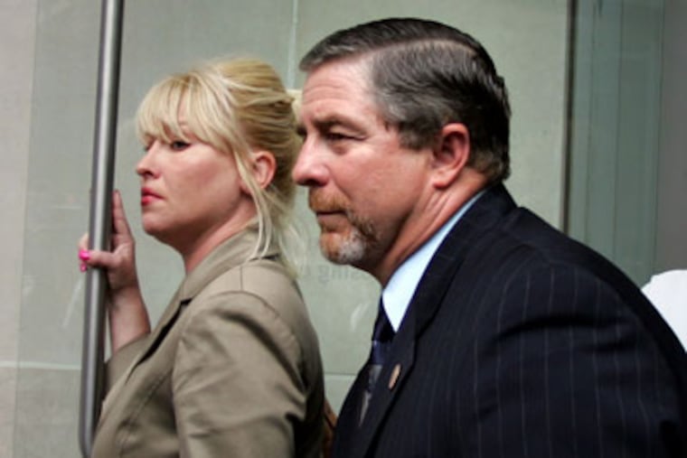 Ex-Councilman Rick Mariano with his wife, Susan, after receiving a 6-year sentence in 2006. (David Swanson/Staff Photographer)