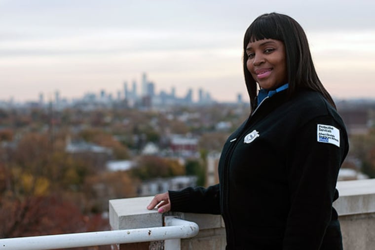 Venus Powell-Uzzel flashes a smile after "the craziest experience she's had" after 5 years of working at Einstein Hospital in Olney. (PATRICK MCPEAK/STAFF PHOTOGRAPHER)