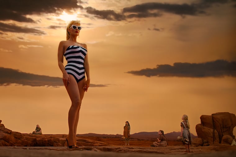 As "Barbie" released in Philadelphia, an unlikely hero made himself known in an advanced screening at the Fashion District AMC. South Jersey's Zach Marsh recited the whole Nicole Kidman AMC ad to an enthralled Philly audience before launching into Twitter virality. This image released by Warner Bros. Pictures shows Margot Robbie in a scene from "Barbie." (Warner Bros. Pictures via AP)