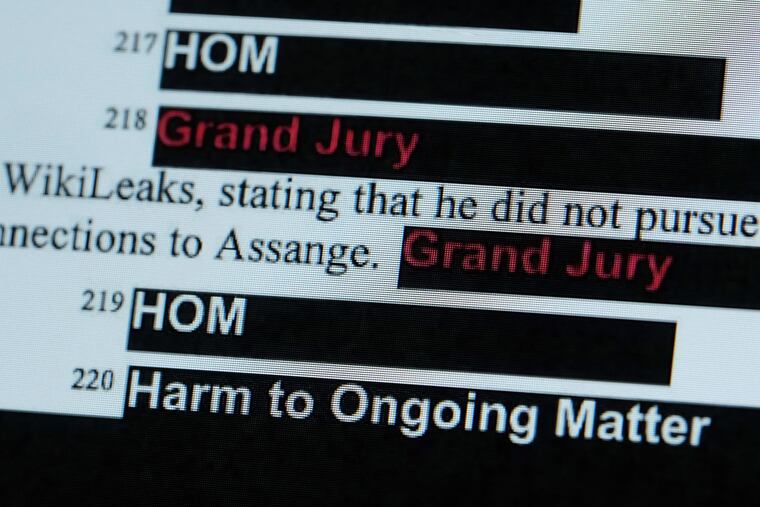 Redactions from special counsel Robert Mueller's report on Russian interference in the 2016 election are seen on a computer screen in Portland, Ore., on April 18, 2019, after the document was released by Attorney General William Barr.