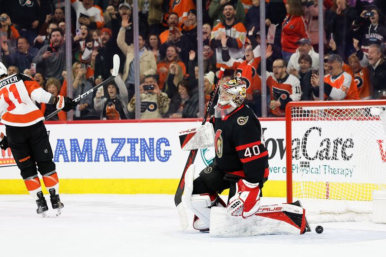 Flyers right wing Tyson Foerster skates past Ottawa Senators goaltender Mads Sogaard after scoring on a penalty shot on Saturday.