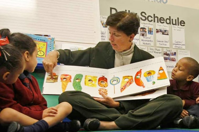 Camden County School Superintendent Peg Nicolosi with LEAP Academy University Charter pre-schoolers in 2009. Tax-exempt status was revoked. MICHAEL S. WIRTZ / Staff Photographer