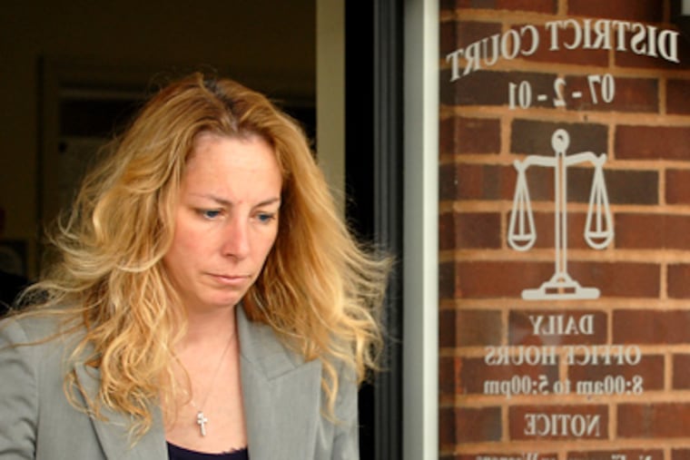 Bonnie Sweeten leaves District Court in Richboro today after her preliminary hearing on charges of identity theft and making a false report to police in the Disney World abduction hoax which created a national media frenzy. (Tom Gralish / Staff Photographer)