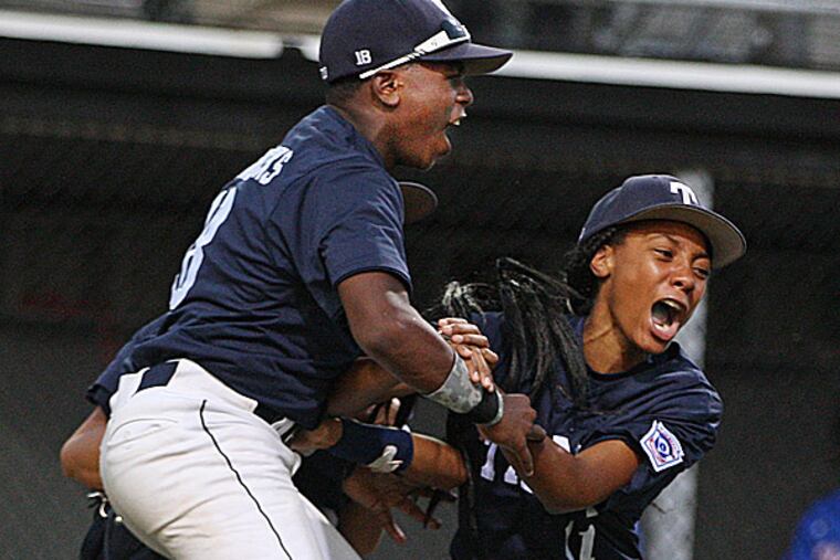 Taney's Jahli Hendricks, Scott Bandura and Mo'ne Davis. (Michael Bryant/Staff Photographer)