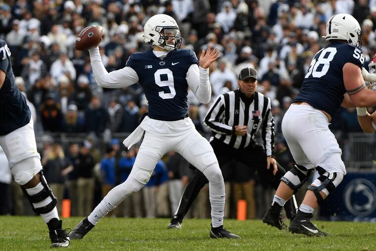 Penn State freshman quarterback Christian Veilleux, making his collegiate debut, throws a pass against Rutgers during the first half of an NCAA college football game in State College, Pa., Saturday, Nov. 20, 2021. Veilleux, who replaced starter Sean Clifford, threw three TD passes.