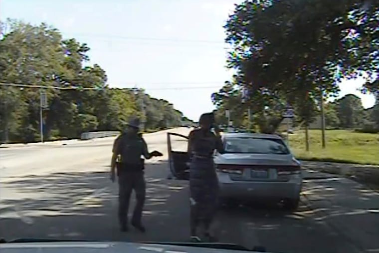 FILE - In this July 10, 2015, file frame from dashcam video provided by the Texas Department of Public Safety, Trooper Brian Encinia arrests Sandra Bland after she became combative during a routine traffic stop in Waller County, Texas. Texas authorities faced sharp questioning over why cell phone video Sandra Bland took during her confrontational 2015 traffic stop never publicly surfaced until May 2019. (Texas Department of Public Safety via AP, File)