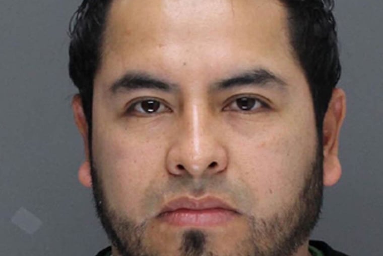 Adolfo Delacruz is charged with bribing an undercover investigator to pass health inspections at the pizzeria where he works.