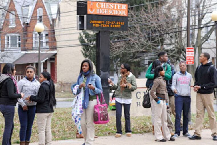 Chester High students after dismissal. District students will finish the year, but "the present structure is simply unsustainable," Gov. Corbett and Sen. Dominic Pileggi (R., Del.) have said. (Clem Murray / Staff)
