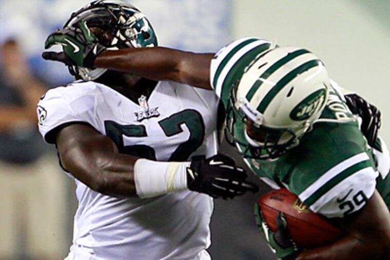 Brian Rolle, left, has been released by the Eagles. (Yong Kim/Staff Photographer)