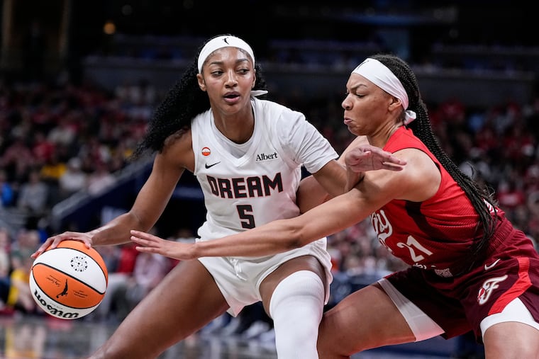 Dream forward Angel Reese (left) was named a WNBA All-Star reserve.