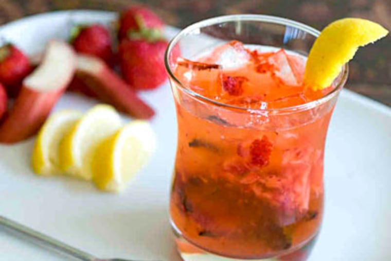 Oolong tea made with strawberry puree, rhubarb, and a touch of lemon, at Lotus Farm to Table. (Clem Murray / Staff Photographer)