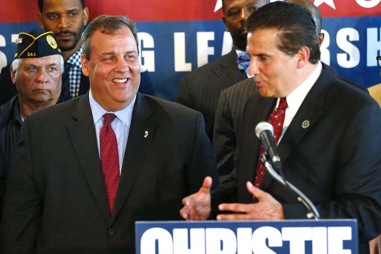 New Jersey Gov. Chris Christie (left) and Essex County Executive Joe DiVincenzo at McLoone’s Boat House in West Orange, N.J., in June 2013.