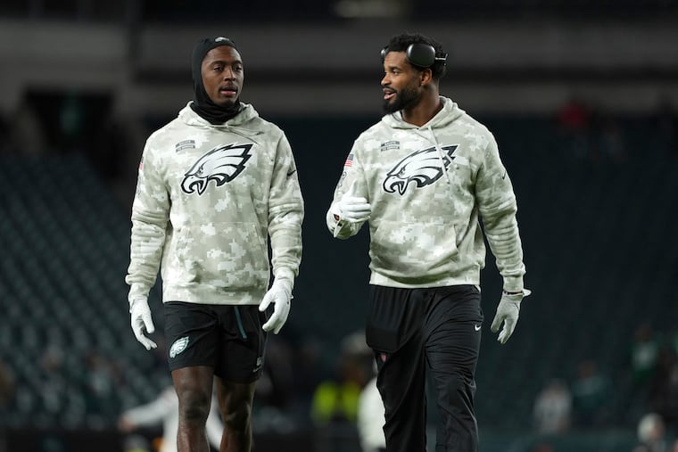 Philadelphia Eagles cornerback Quinyon Mitchell (left) was a finalist for Defensive Rookie of the Year. (AP Photo/Matt Slocum)