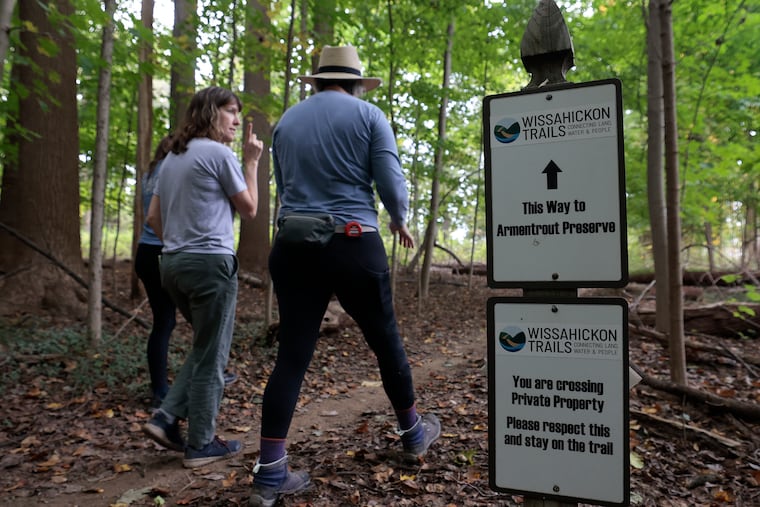 A group hikes out of the Camp Woods Preserve in Blue Bell, Pa. in October 2023.