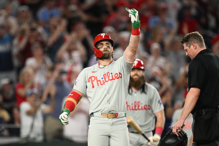 Bryce Harper celebrates after his go-ahead two-run homer in the ninth inning on Thursday.