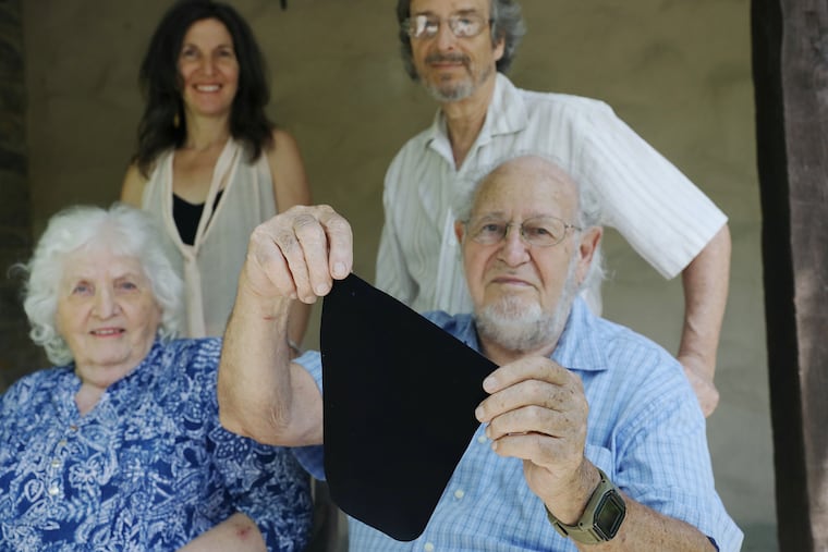 Solomon Rosenblatt (clockwise from bottom right), 91; his wife, Vicky; their daughter, Elise Rivers; and her husband, Max, pose for a portrait outside their home in Philadelphia's Chestnut Hill section on Friday, June 26, 2020. Solomon Rosenblatt, a biomedical chemist, invented the IoWipe, an iodine-based, reusable sanitizing wipe, which the Rivers are helping to market and sell.