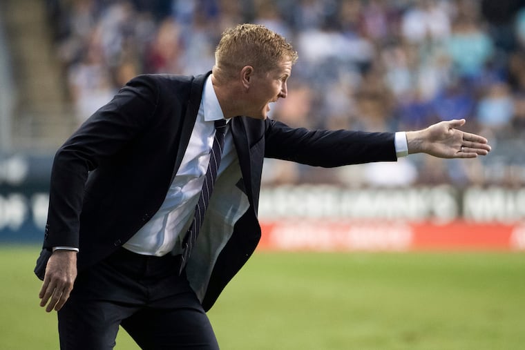 Philadelphia Union coach Jim Curtin reacts during the first half of the team's MLS soccer match against the Seattle Sounders, Saturday, May 18, 2019, in Chester, Pa. (AP Photo/Chris Szagola)