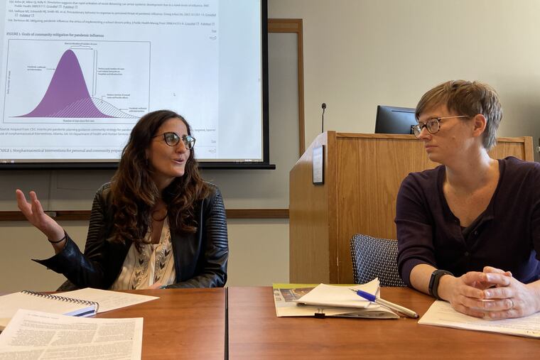 Carolyn Cannuscio, an associate professor at Penn's Perelman School of Medicine, teaches a class on measures that can help slow the spread of the coronavirus, joined by Alison M. Buttenheim, associate professor at Penn Nursing.