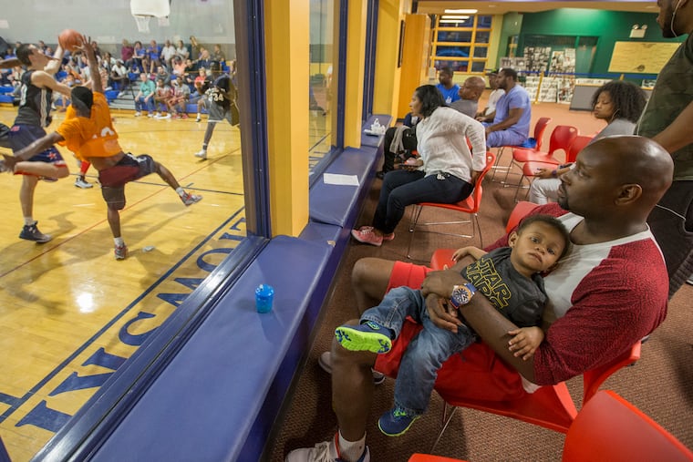 Amauro Austin, one of the leaders of the AAU team Philly Pride, watches the 2017 Donofrio Classic -- an event where top high school athletes have played for decades. Division I coaches aren't allowed to see these games under the current recruiting calendar.