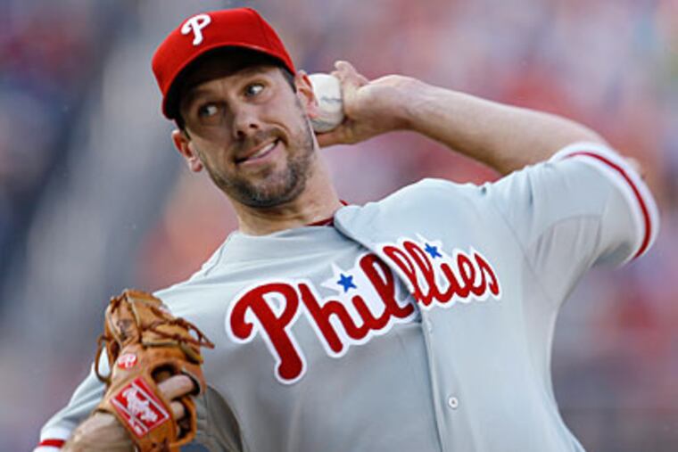 Cliff Lee allowed back-to-back home runs in the second inning of Sunday's game. (Carolyn Kaster/AP)