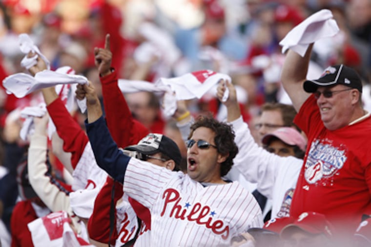 Fans cheer Cliff Lee and the Phillies at Citizens Bank Park yesterday. (Ron Cortes / Staff Photographer)