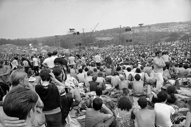 This Aug. 14, 1969 file photo shows a portion of the 400,000 concert goers who attended the Woodstock Music and Arts Festival held on a 600-acre pasture near Bethel, N.Y.