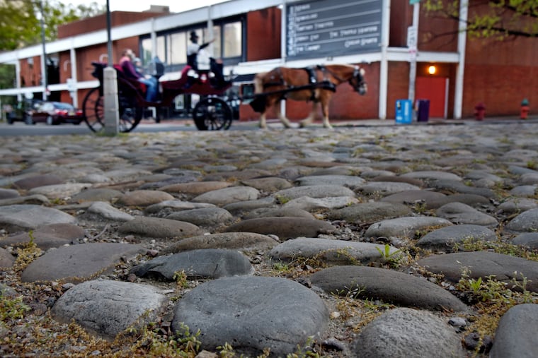 Dock Street at Walnut Streets. Writers Kim Kelly and Andrew Pry Ortega go head-to-head to battle over one of Philly's most iconic — or is it iconically annoying? — local features: cobblestoned streets.