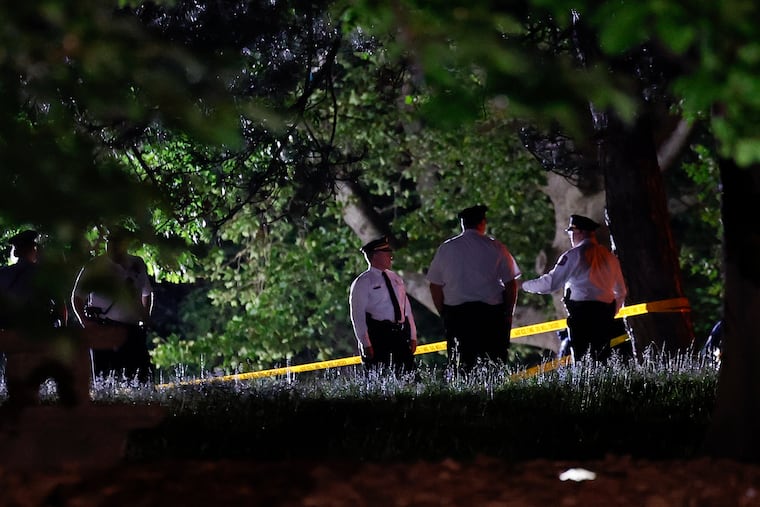Philadelphia police investigate the shooting at Lemon Hill in Fairmount Park on Monday.