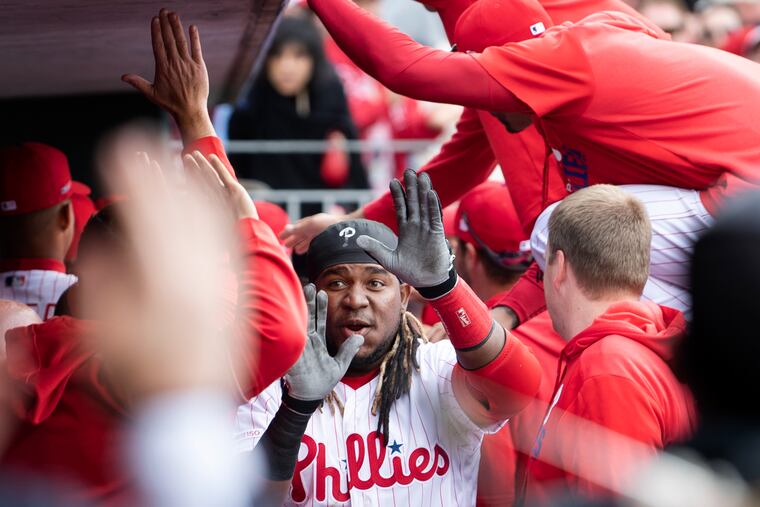 Philadelphia Phillies, Maikel Franco in congratulated after hitting a two run home run in the bottom of the 6th inning against the Atlanta Braves at Citizens Bank Park, in Philadelphia, Pa. Thursday, March 28, 2019.