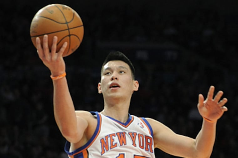 Guard Jeremy Lin has become a sensation for the Knicks. (AP Photo/Bill Kostroun)