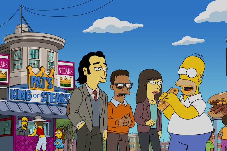 Homer (Dan Castellaneta) eats a cheesesteak in South Philly in an upcoming episode of 'The Simpsons.'