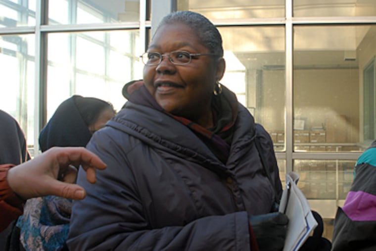 Agnes James waits outside Philadelphia Health Care Center #10 before it opened on March 5. ( Tom Gralish / Staff Photographer )