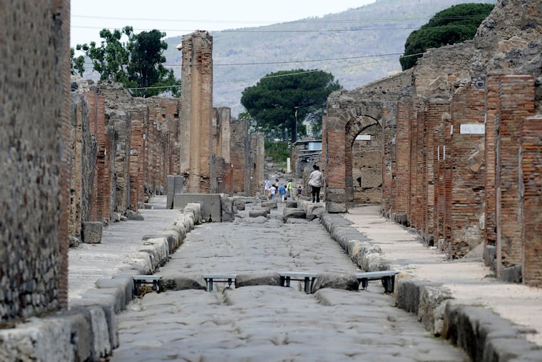People visit the archaeological site of Pompeii, near Naples, in southern Italy, on May 26, 2020.