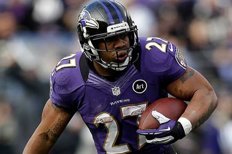 Ravens running back Ray Rice (27) runs with the ball and gets away from Indianapolis Colts inside linebacker Jerrell Freeman (50), for a 47-yard gain, during the first half of an NFL wild card playoff football game Sunday, Jan. 6, 2013, in Baltimore. (Patrick Semansky/AP)