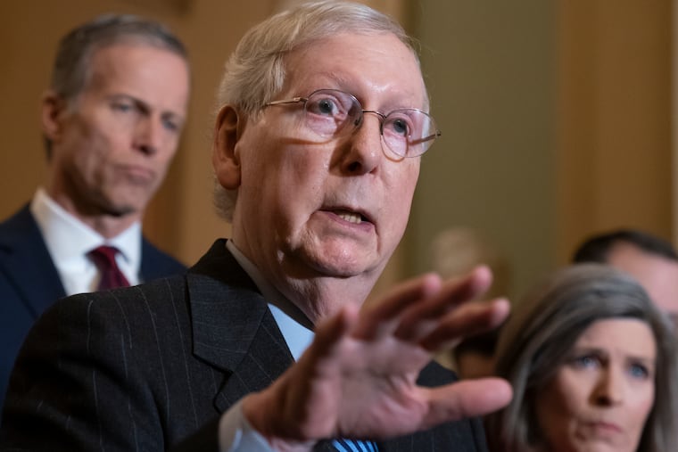 Senate Majority Leader Mitch McConnell, R-Ky., joined by Majority Whip John Thune, R-S.D., left, and Sen. Joni Ernst, R-Iowa, tells reporters he has secured enough Republican votes to start President Donald Trump's impeachment trial and postpone a decision on witnesses and documents Democrats want, at the Capitol in Washington, Tuesday Jan. 7, 2020. The trial could start as soon as this week if House Speaker Nancy Pelosi releases the articles of impeachment.