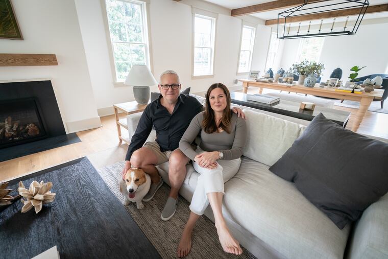 Brian and Adrienne Niles in the living room of their recently renovated home. This area used to be part of an in-law suite.