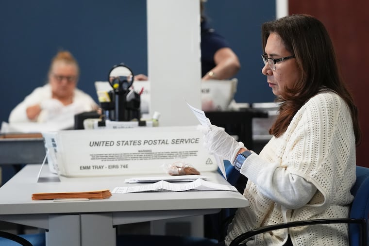 Employees sort vote-by-mail ballots from municipal elections on Election Day at the Miami-Dade County Supervisor of Elections Office, Nov. 4, 2025, in Doral, Fla.