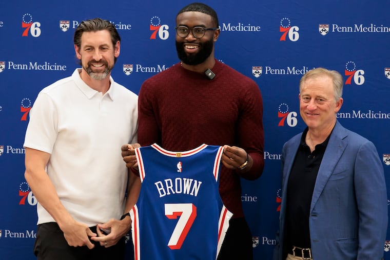 Mike Gansey, Jaylen Brown and Josh Harris pose as the Sixers star is introduced in Philly.