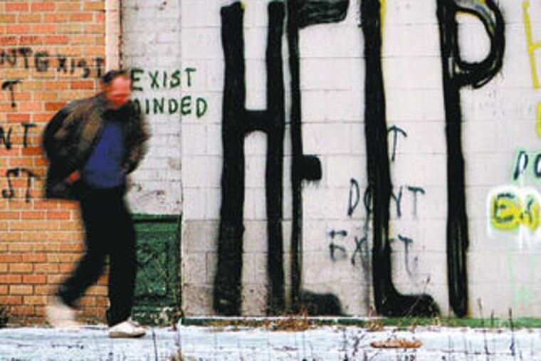 "HELP" reads a wall in Detroit, where over 21 percent are jobless, the ex-mayor is jailed and the football team is 0-14.