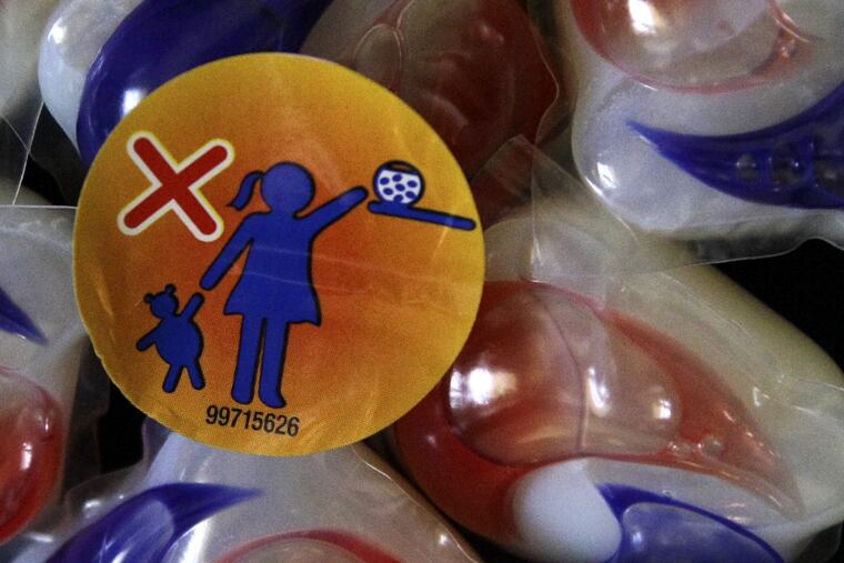 A warning label is attached to a package of Tide laundry detergent packet. Procter & Gamble says it’s working to stop the “Tide Pod challenge,” a social media-fueled trend in which teenagers eat single-load laundry detergent packets.