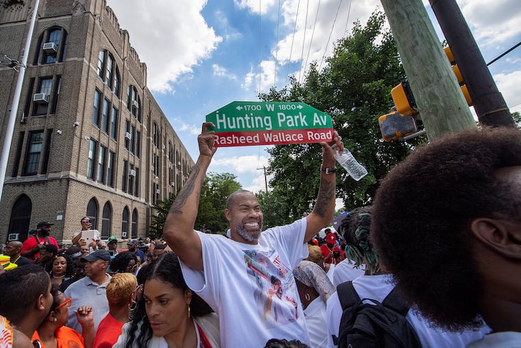 Former NBA player Rasheed Wallace races his street sign at the Simon Gratz High School in Philadelphia, Pa. Friday, June 24, 2022. The block of 18th and Hunting Park Ave is officially be named Rasheed Wallace Road.
