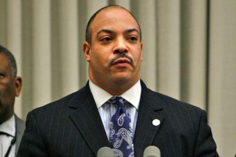 Philadelphia district attorney Seth Williams announces this morning that former police Officer Frank Tepper is charged with murder in the Nov. 21 shooting death of William "Billy" Panas Jr. on their Port Richmond street. (Alejandro A. Alvarez / Staff Photographer)