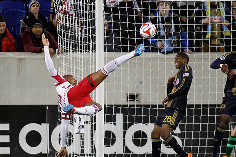New York Red Bulls forward Thierry Henry tried a scissor-kick shot during the first half. (Andy Marlin/USA Today Sports)
