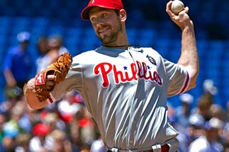 Cliff Lee allowed three home runs in a four-run eighth inning. (Darren Calabrese/AP)