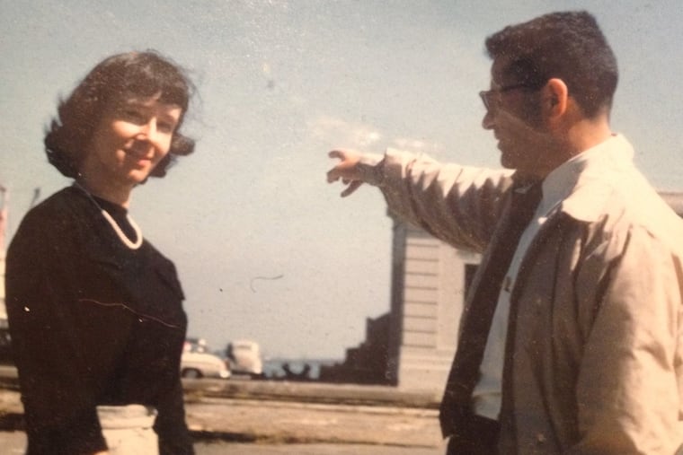 Mrs. Green looks at the camera while her husband, Lewis, points out a landmark on their honeymoon trip in 1956.